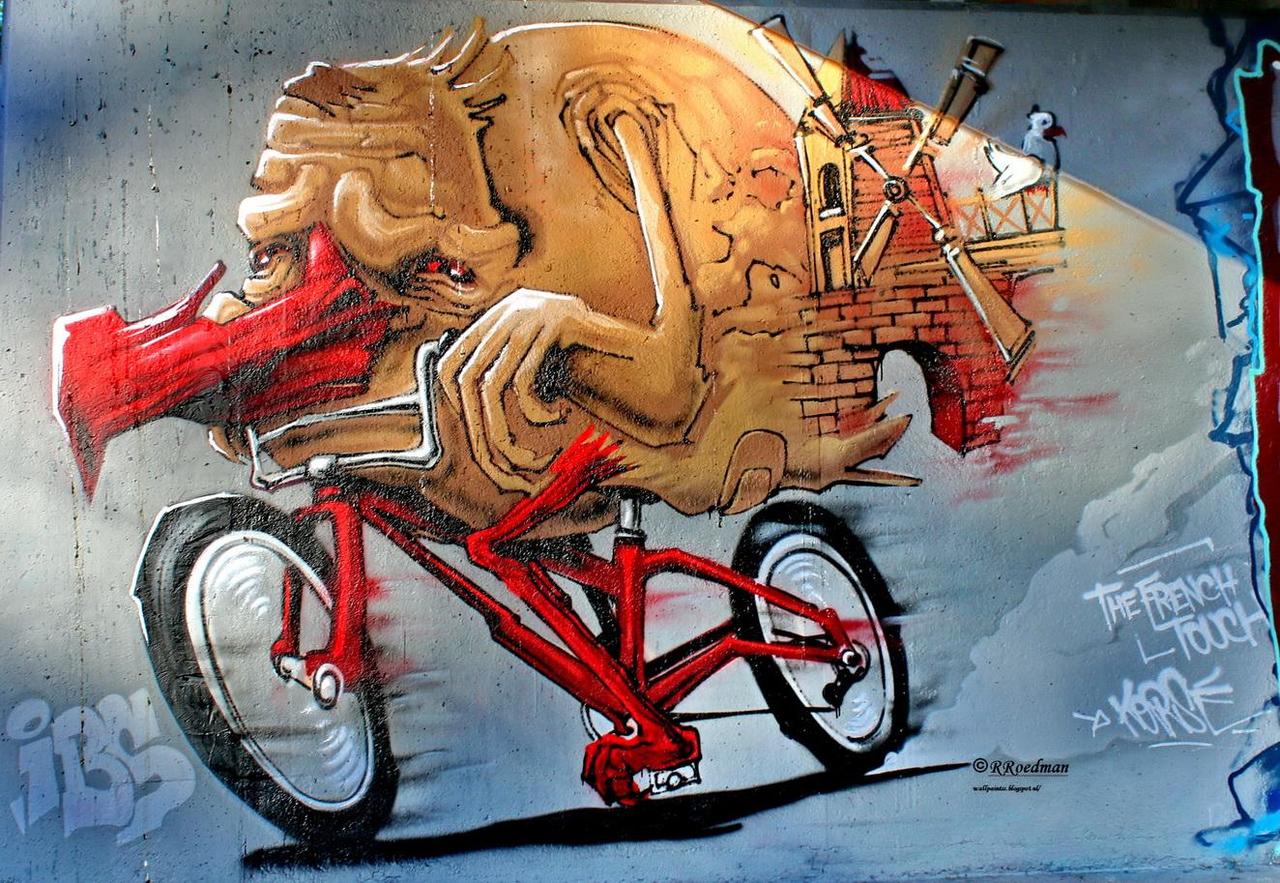#streetart #graffiti #mural  surrealistic bird on a bike in #Amsterdam from #IBS ,2 pics at http://wallpaintss.blogspot.nl http://t.co/4geKuPPYQk