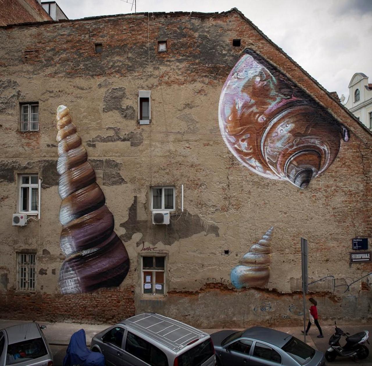 Lonac paints 'Xenophora' a new mural in Zagreb, Croatia. #StreetArt #Graffiti #Mural http://t.co/7FEtIJhRUT