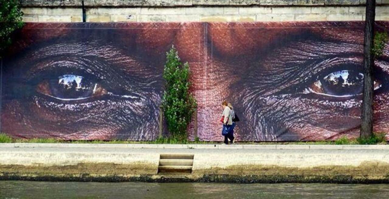 RT @designopinion: Artist 'Reza' amazing hyperrealistic Street Art mural located in Paris. #art #mural #graffiti #streetart http://t.co/vaJft2mdt9
