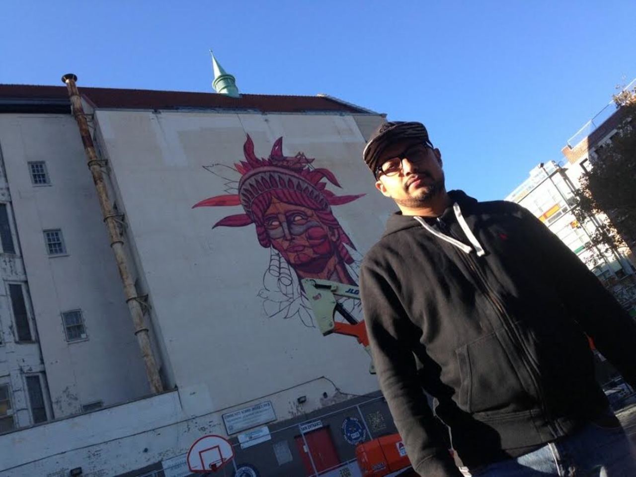 Sego painting a mural on a school in  Harlem! #sego #harlem #mural #nyc #art #streetart #graffiti http://t.co/KOlvCQGJME