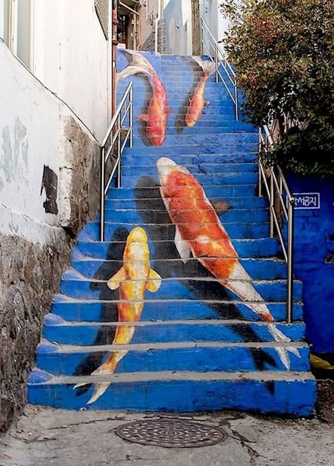 Street #Art #Graffiti: "Swimming to the Surface" Koi fish steps in #Seoul, South Korea Photo by Kevin Lowry. http://t.co/2nDS0w80jg