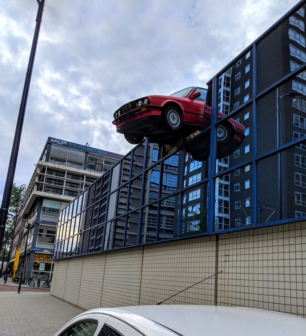 Art installation or crazy close call?         _________________________________⠀⠀ #travel #car #installation #explore #rotterdam #netherlands #cars #holiday #cityscape #art https://t.co/8NwCIQoUUm
