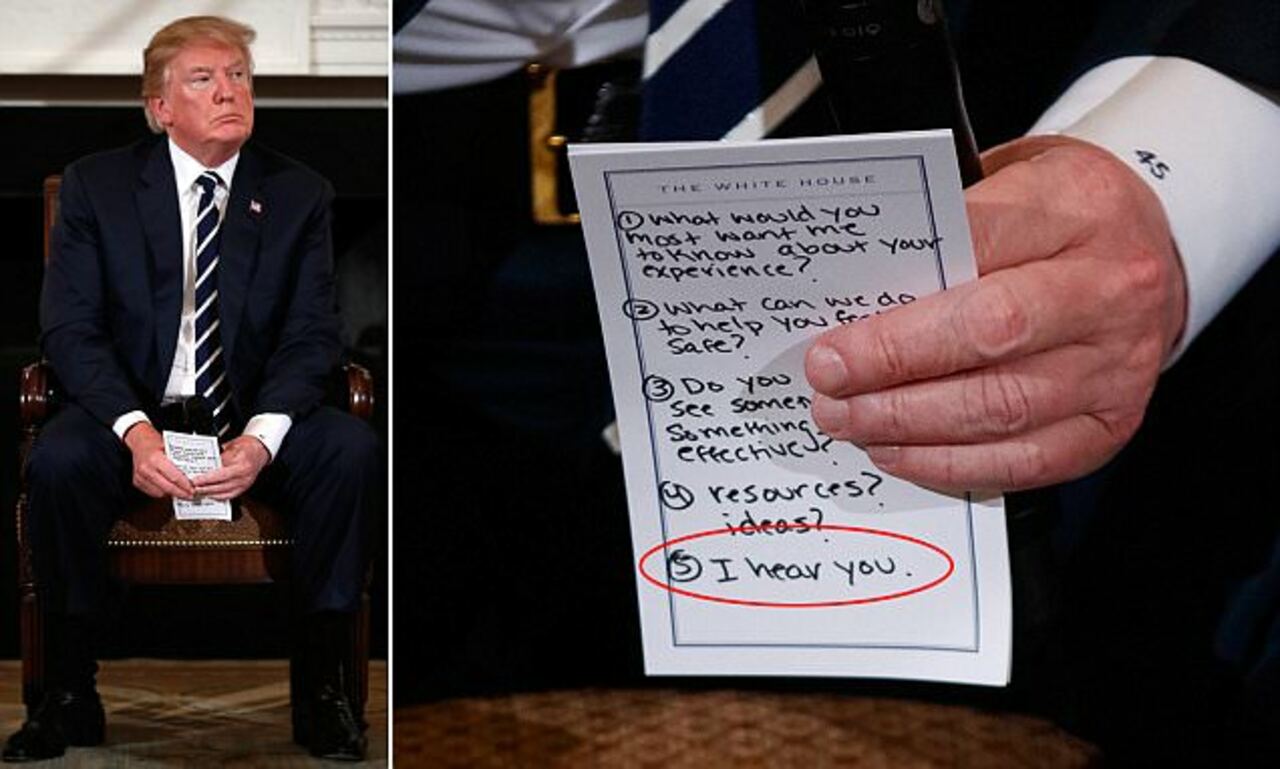 'Trump uses a CUE-CARD to remind himself to say 'I hear you'